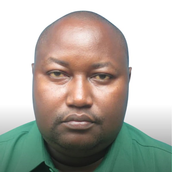 Portrait of Dr. Calvin Mbora Mwasha